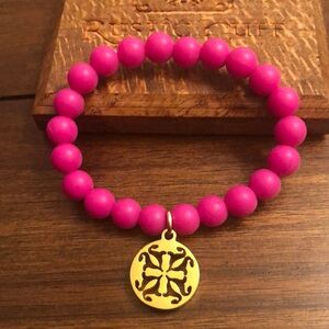 Rustic Cuff Hot Pink Silicone Beaded Bracelet with Gold Logo Charm.